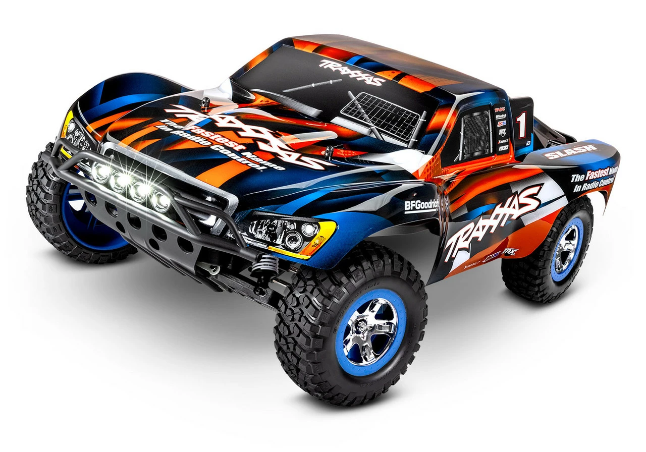 TRA58034-61ORG TRAXXAS Slash 1/10 RTR Short Course Truck W/ LED Lights, TQ 2.4GHz Radio, Battery And DC Charger - Orange 1 TRA58034-61ORG TRAXXAS Slash 1/10 RTR Short Course Truck W/ LED Lights, TQ 2.4GHz Radio, Battery And DC Charger - Orange