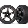 TRA9370 TRAXXAS Tires And Wheels, Assembled, Glued (split-spoke Black Chrome Wheels, 2.1" Response Tires) (front) (2)
